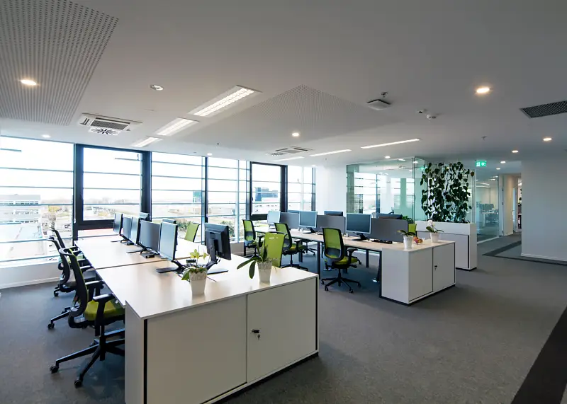 Commercial Renovation of a modern office floor with windows overlooking the city